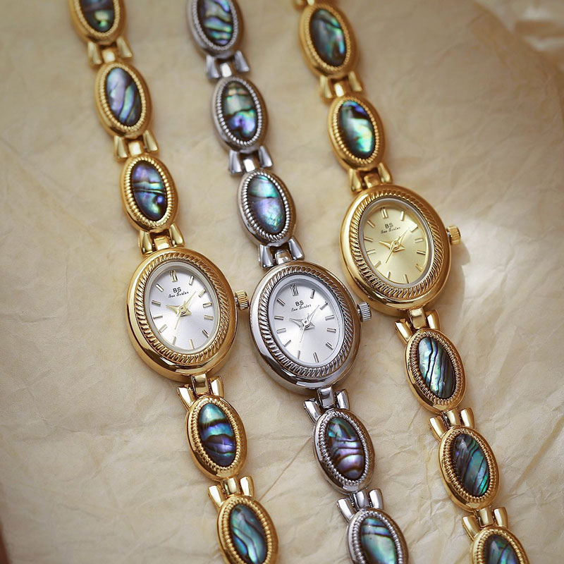 ساعة كلاسيكية طبيعية فاخرة من  - مراجعة Luxury Watch Gold And Black وسعره